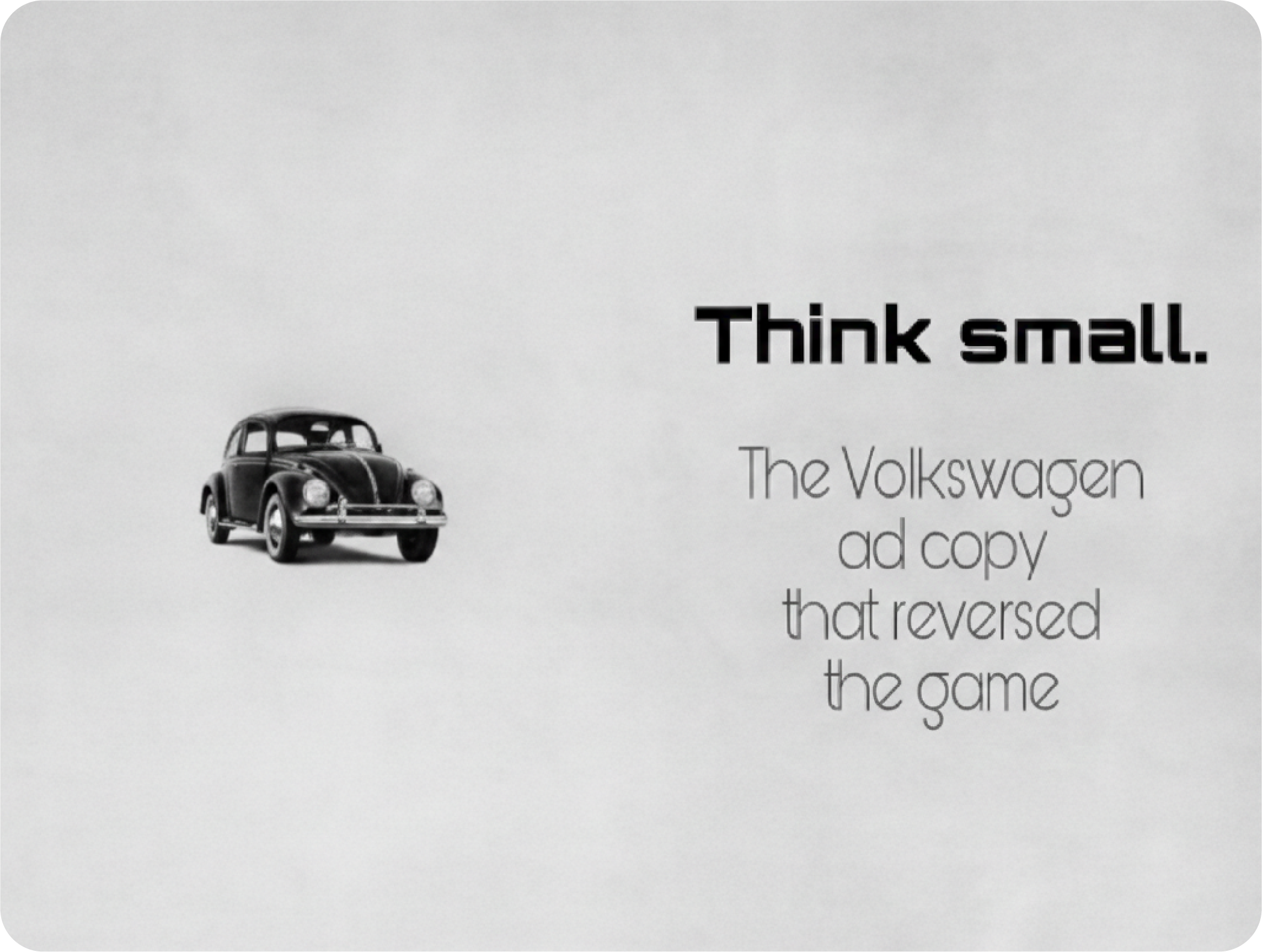 Iconic Volkswagen Think Small vintage print advertisement featuring a minimalist Beetle car.